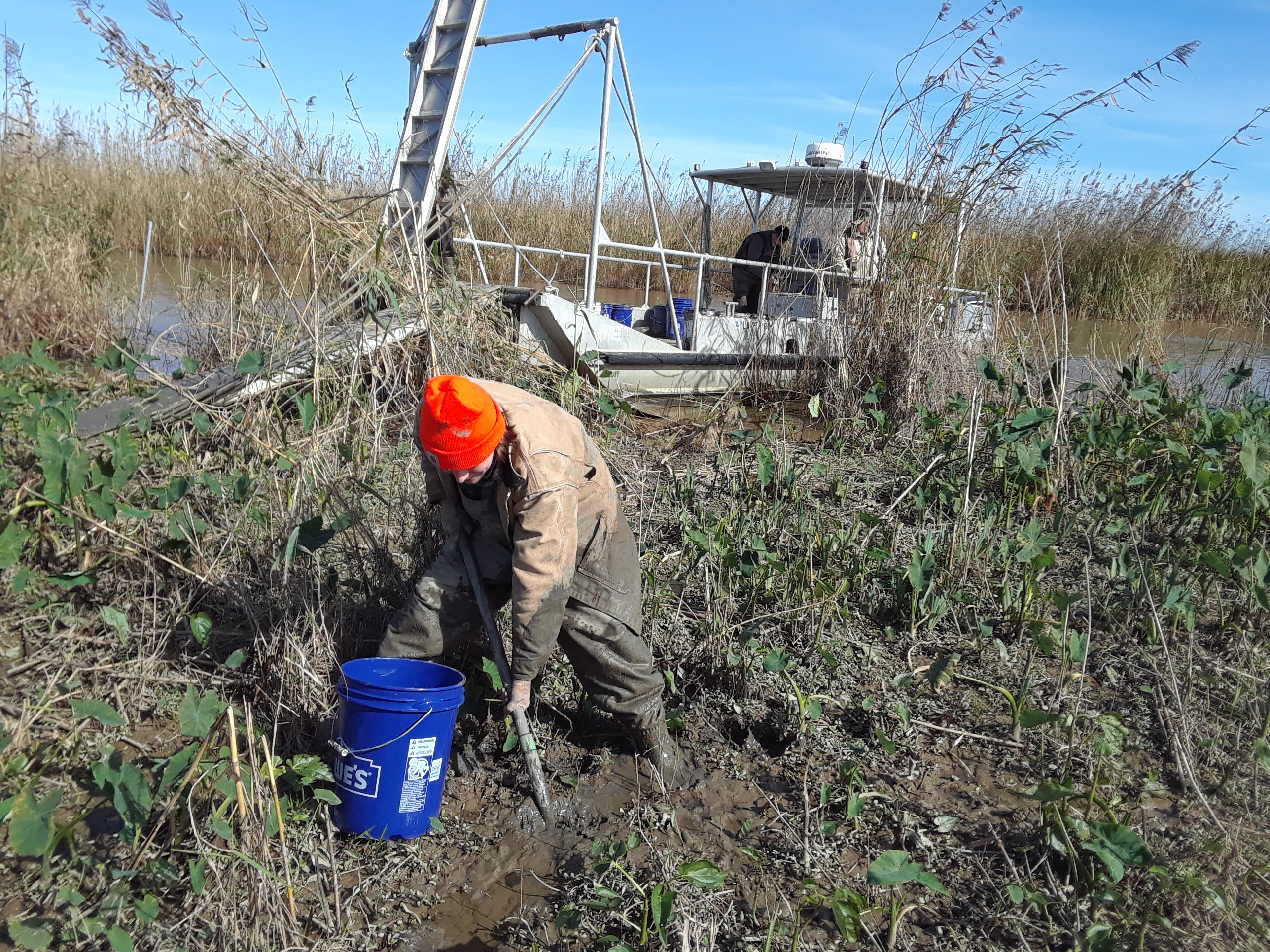 Research associate Seth Spinner collecting soil samplesjpg